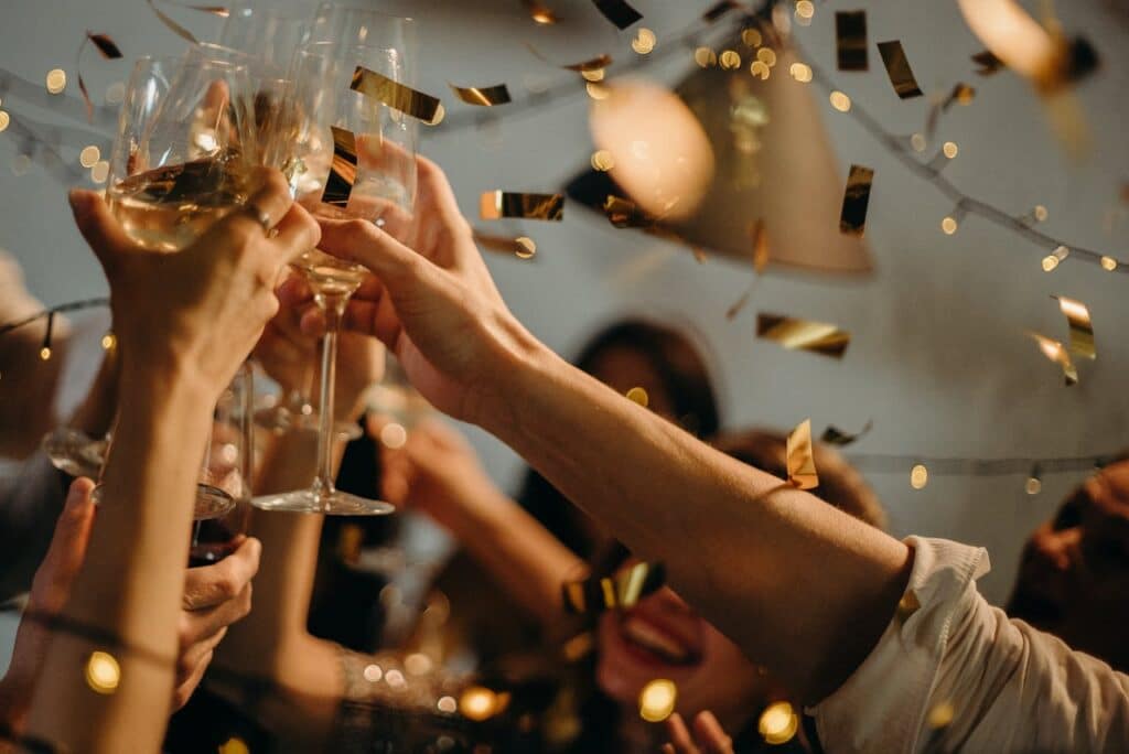 Pexels Photo by cottonbro studio: https://www.pexels.com/photo/people-toasting-wine-glasses-3171837/ -- holiday party; nyc venues