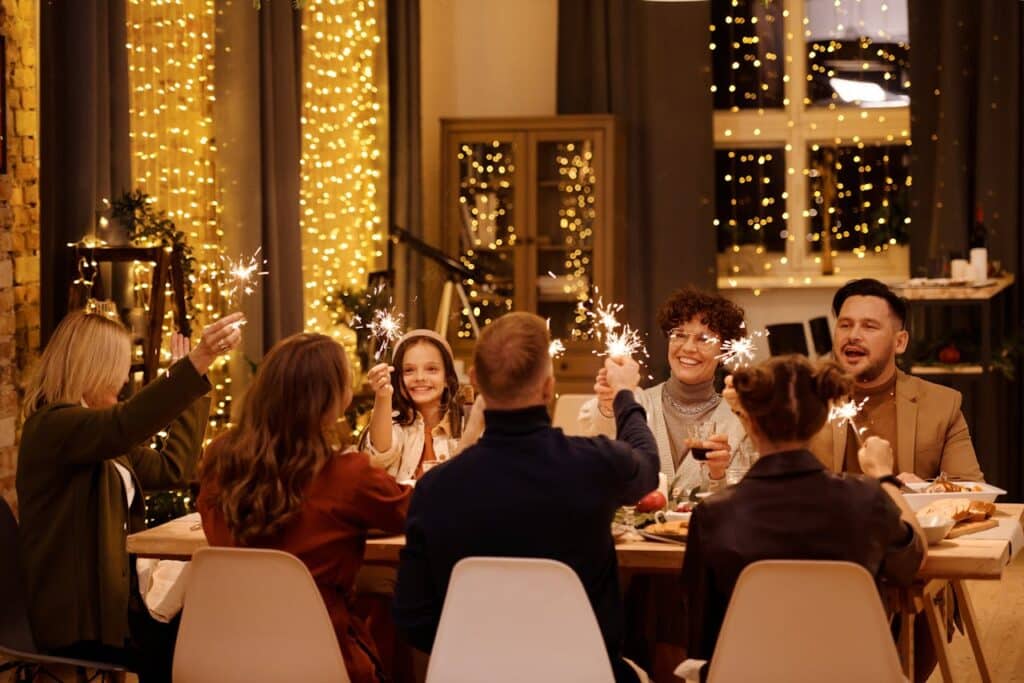 Photo by Nicole Michalou : https://www.pexels.com/photo/family-having-a-christmas-dinner-together-5778894/ -- holiday party