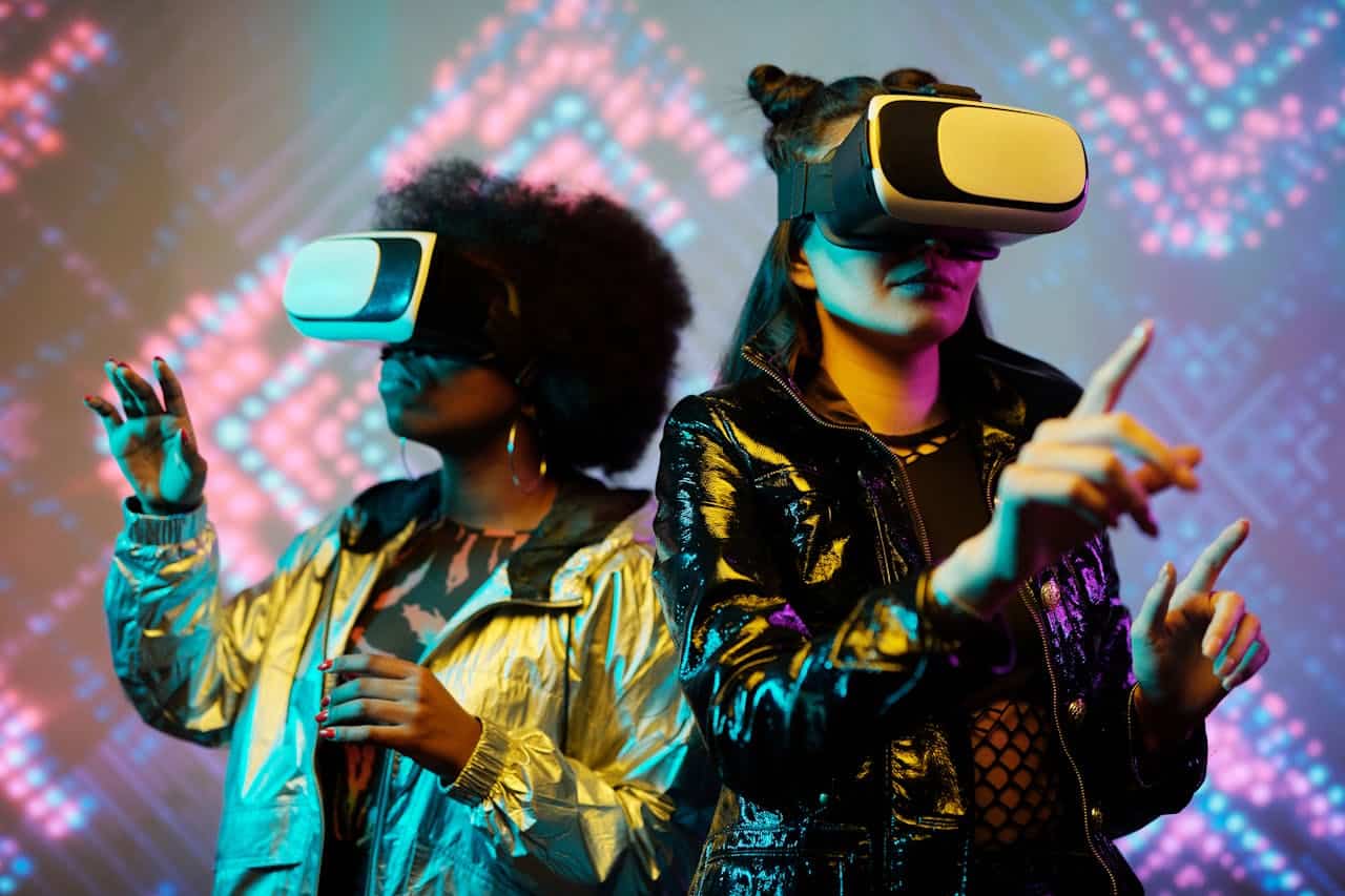 Photo by Darlene Alderson: https://www.pexels.com/photo/two-young-women-wearing-vr-goggles-4389741/ -- virtual reality, gaming companies