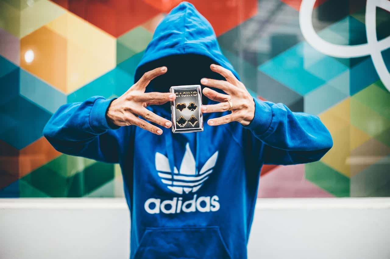 Photo by Kaique Rocha: https://www.pexels.com/photo/man-in-blue-adidas-hoodie-doing-magic-trick-48013/ -- NYC magicians